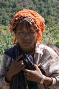 �ena z etnika Munn Chin. Dekorativn� tetov�n� tv��e pokra�uje a� na krk. Provincie Chin. Myanmar (Barma).